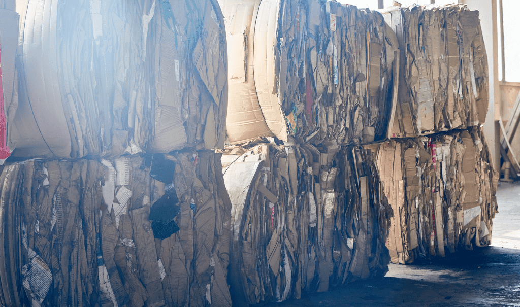 a large stacks of cardboard